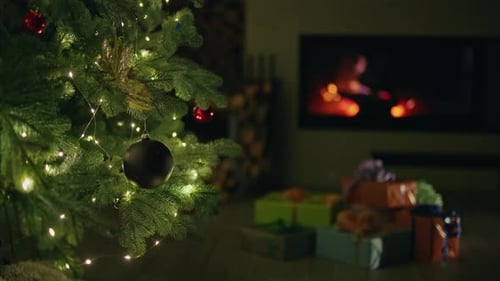 Christmas Tree with Ornaments and Presents Indoors