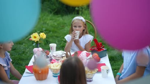Kids Celebrating at Summer Birthday Party