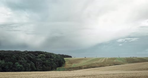 Heavy Rainclouds And Sky Over Empty Field Time Lapse
