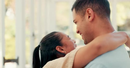 Affectionate Couple Embracing Indoors