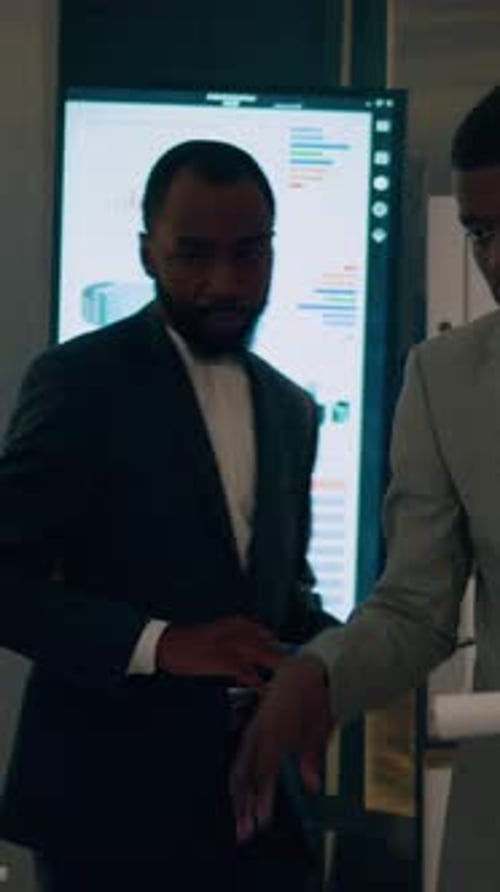 Vertical Video Employees Having Trouble with Work Tasks