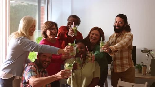 Smiling Friends Raising Glasses in a Toast Together