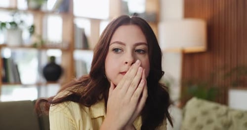 Sad, woman and thinking in lounge, lonely and decision for breakup, remember