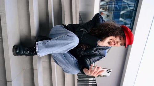 Young Woman Recording Video on Smartphone