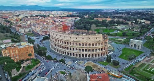 Establishing Shot Drone Flying of the Colosseum Famous Ancient Roman Arena Downtown Rome Italy The