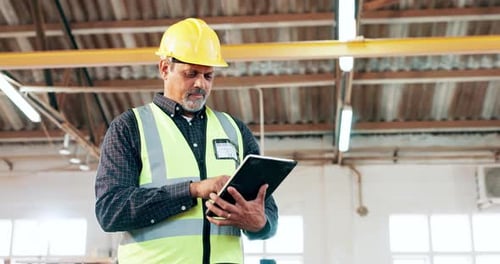 Senior man, tablet and architect in construction for research, communication