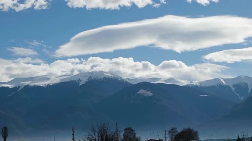 Mountain timelapse with beautiful clouds