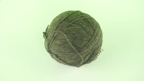 Close Up of Ball of Green Yarn