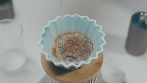 Water Pouring Over Coffee in Filter