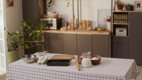 Kitchen Table Baking Ingredients in Bright Indoor Setting