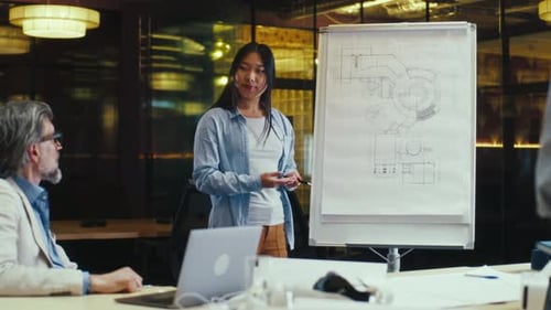 Architect Presents Design to Colleagues in Warm Office