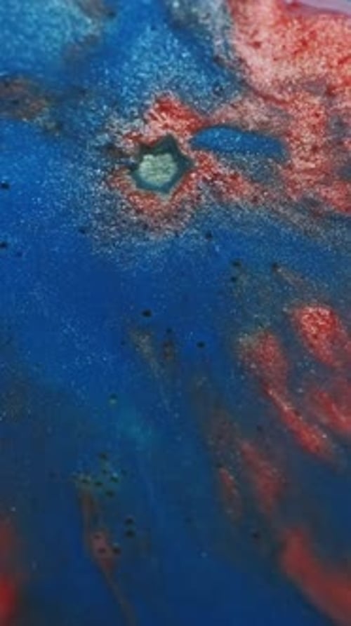Abstract close up of red and blue paint