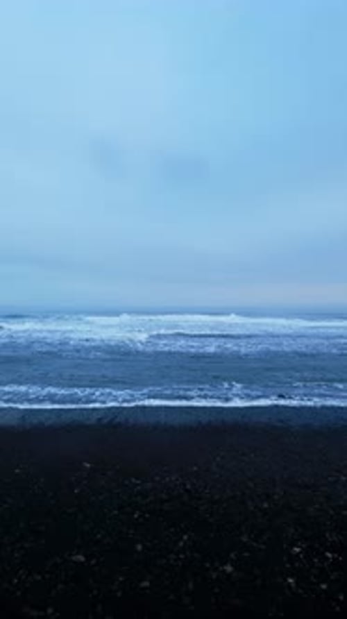 Vertical Video Drone Shot of Nordic Ocean Shore