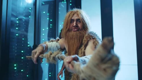 Cavemen in Server Room Wielding Club Threateningly