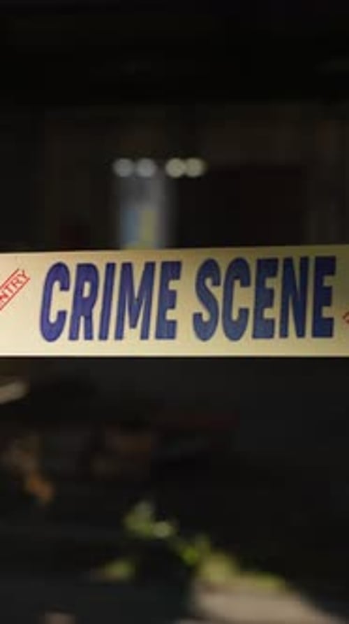 Building, night and yellow tape for crime scene, investigation or barricade for warning