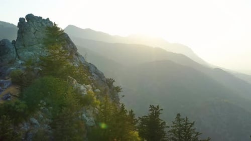 Aerial sunset shot with mountain range