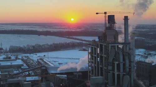Aerial View of Cement Factory with High Concrete Plant Structure and Tower Crane at Industrial