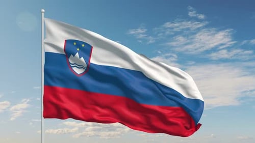 Slovenia Flag Waving Proudly Against the Clear Blue Sky