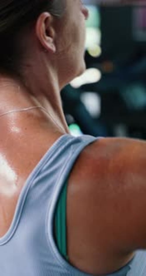 Barbell, lifting and back of woman in gym for fitness, exercise and bodybuilding training