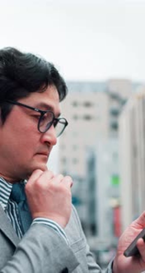 Japanese, businessman and thinking with phone in city, market research and online with information