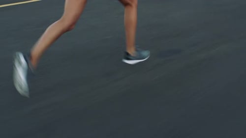 Running, exercise and person in city, legs and training for health benefits