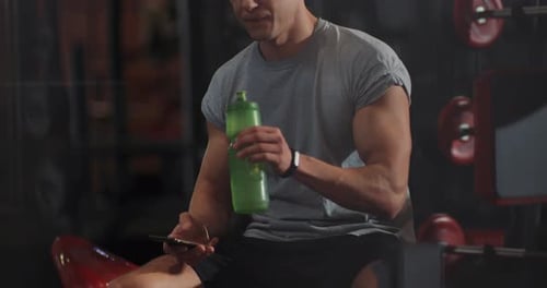 Smile Young Man Use Phone in Gym Sportsman Sport Fitness Internet Face Technology Fit Lifestyle Male