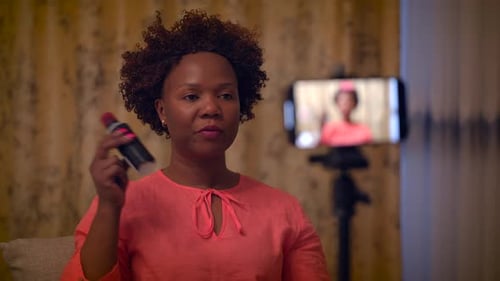 Woman Recording Beauty Content at Home