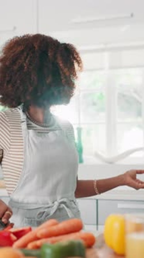 Couple Cooking Healthy Food Together in Kitchen