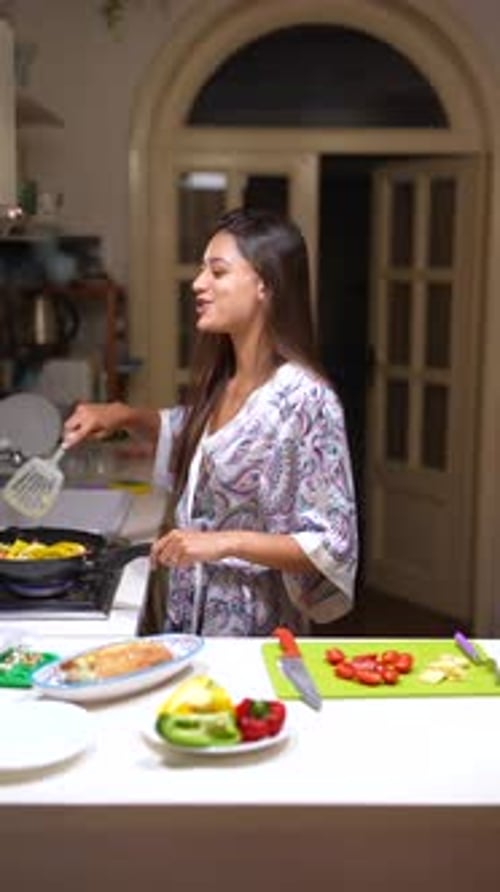 In This Stock Photo a Woman is Seen Preparing a Nutritious Meal in a Contemporary Kitchen Setting