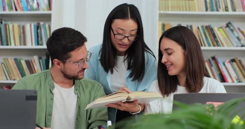 Happy Multi Ethnic College Students Smiling Look at Camera Posing in Modern University Library