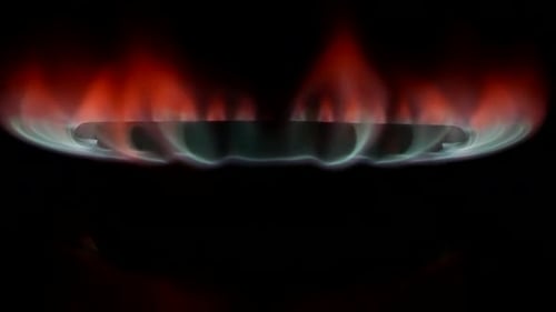 Macro Shot with Inflaming Kitchen Gas Stove Closeup View of Fire in Darkness Slow Motion