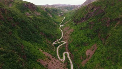 Norwegian Coastal Winding Mountain Road on Lofoten Islands From Low Angle Summer