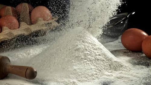 The Cook Sifts the Flour Filmed on a Highspeed Camera at 1000 Fps