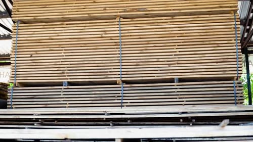 Stacked Lumber Folded Wood Closeup Wooden Boards The Surface of the End of the Board Lots of Planks