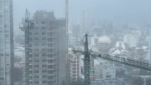 Tower Crane in the Fog in the City of Buenos Aires, Argentina.