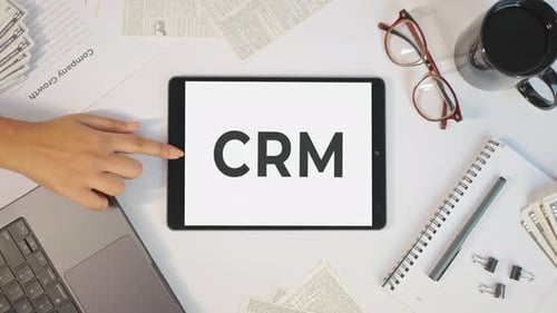 CRM Displayed on Tablet in Modern Office