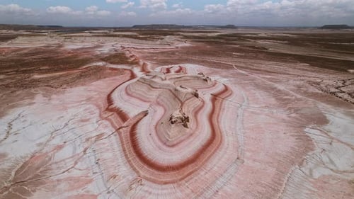 A Breathtaking Aerial View of the Uniquely Colored Salt Flats Found in a Stunning Landscape