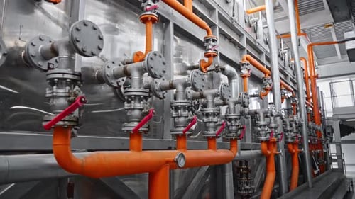 Industrial Cleaning System in a Food Industry Stainless Steel Tanks with Filters and Piping