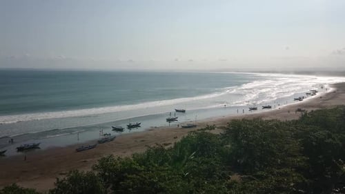 Sea waves on the beautiful beach. Aerial top view of ocean waves break on a beach. Sea waves and bea