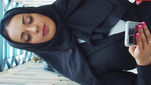 Portrait of Young and Confident Muslim Business Woman with in Hijab Middle Eastern Office Worker or