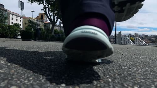Woman Jogging In City, Low Angle, Super Slow Motion 240fps