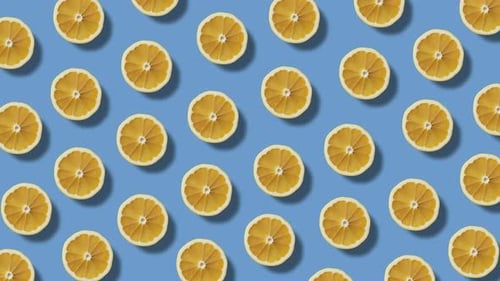 Citrus Fruit Slices Pattern on Blue Background