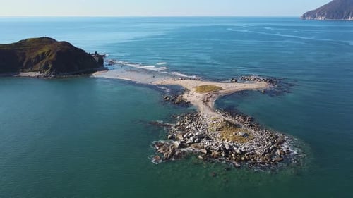 an Aerial View of a Small Island in the Middle of the Ocean