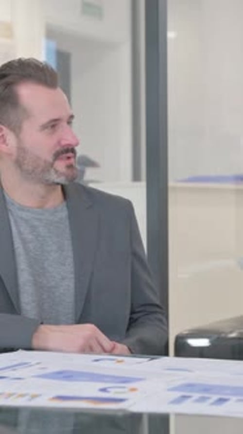 MIddle Aged Man Giving Money to African Man, Shaking Hand, vertical video
