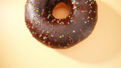 Beautiful brown donuts. Close-up macro video. 4K