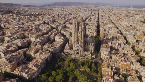 Aerial view shot of La Sagrada Familia Basilica Barcelona at sunrise.