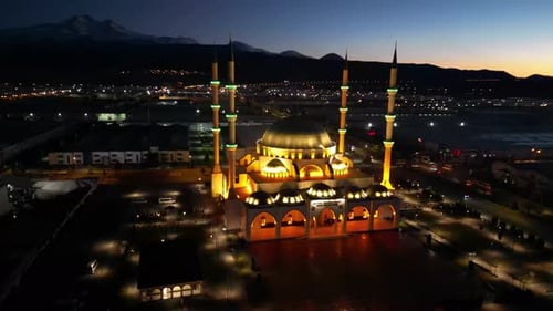 Images of a magnificently illuminated mosque in the evening