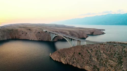 Pag Bridge with Driving Cars Stretches Above Adriatic Sea