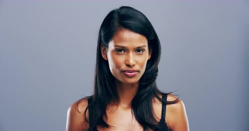 Woman's Expression Changes from Unhappy to Happy