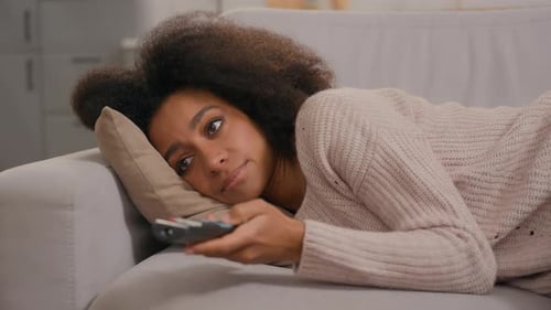 Tired Sad Ethnic African American Woman Relaxing at Living Room Girl Female Watching Television